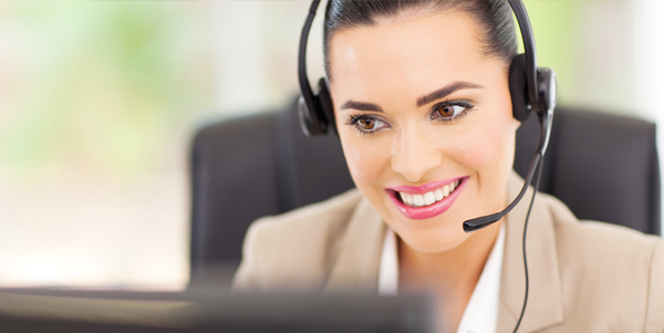 pretty female support center operator with headset